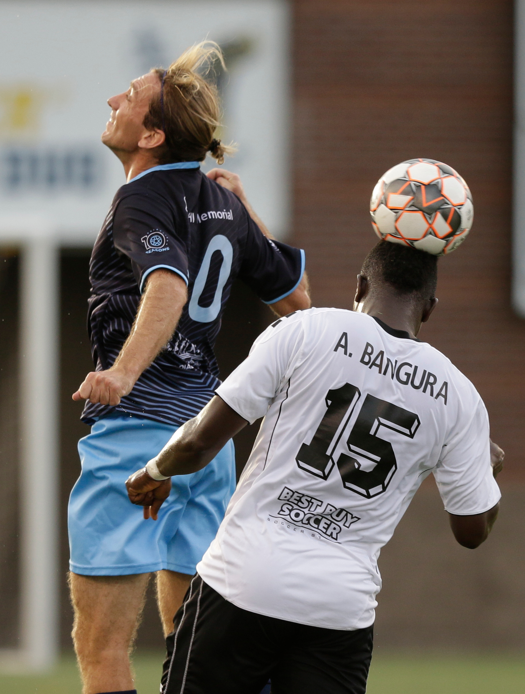 Atlanta's Abdulrahman Bangura (15) heads the ball agains't CFC's Juan Hernandez Mendizibal during Chattanooga FC's soccer match against the Atlanta Silverbacks at Finley Stadium on Wednesday, June 20, 2018, in Chattanooga, Tenn.