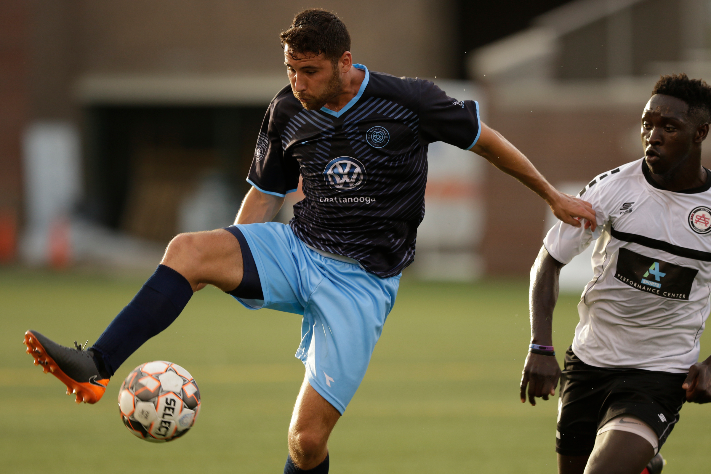 CFC's Pablo Gaona tries to stop the ball ahead of Atlanta's Nyambi Jabang during Chattanooga FC's soccer match against the Atlanta Silverbacks at Finley Stadium on Wednesday, June 20, 2018, in Chattanooga, Tenn.