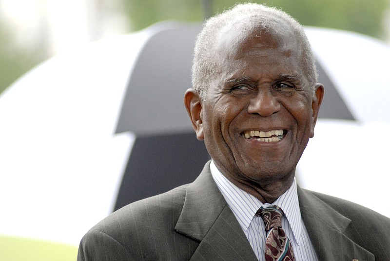 In this 2009 staff file photo, John Franklin Sr., former vice mayor and the first elected black official in Chattanooga, talks to guests during an event held by the Chattanooga History Museum about M.L. King Boulevard.