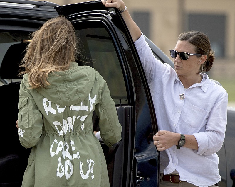 First lady Melania Trump returns to Andrews Air Force Base, Md., Thursday after visiting a facility holding detained immigrant children in McAllen, Texas on the southern border. Her coat, which reads, "I really don't care. Do U?" caused a media stir.