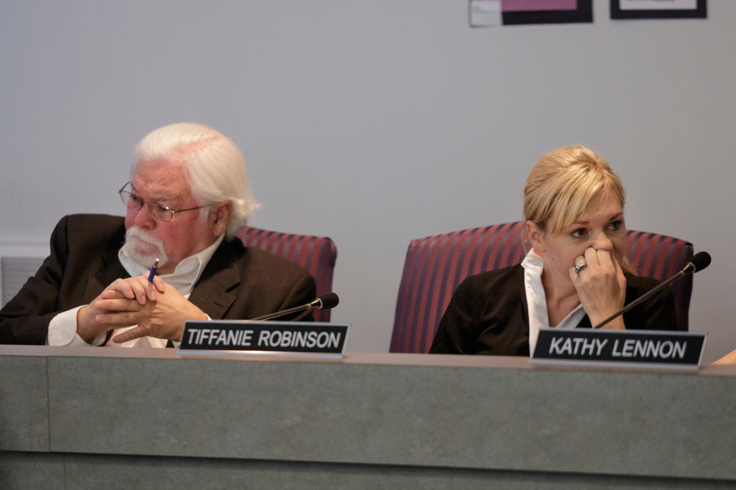 Board members Tiffanie Robinson, right, and David Testerman listen as fellow board member Rhonda Thurman (not pictured) speaks amid a discussion about equity in the school system during a Hamilton County Board of Education work session on Thursday, June 21, 2018, in Chattanooga, Tenn.