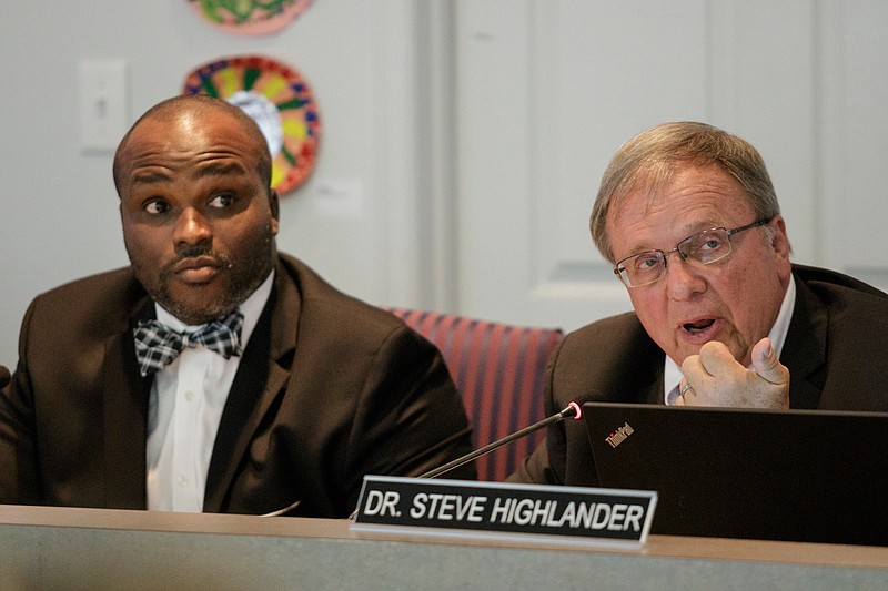 Board chairman Steve Highlander, right, speaks next to schools superintendent Bryan Johnson amid a discussion about equity in the school system during a Hamilton County Board of Education work session on Thursday, June 21, 2018, in Chattanooga, Tenn. 
