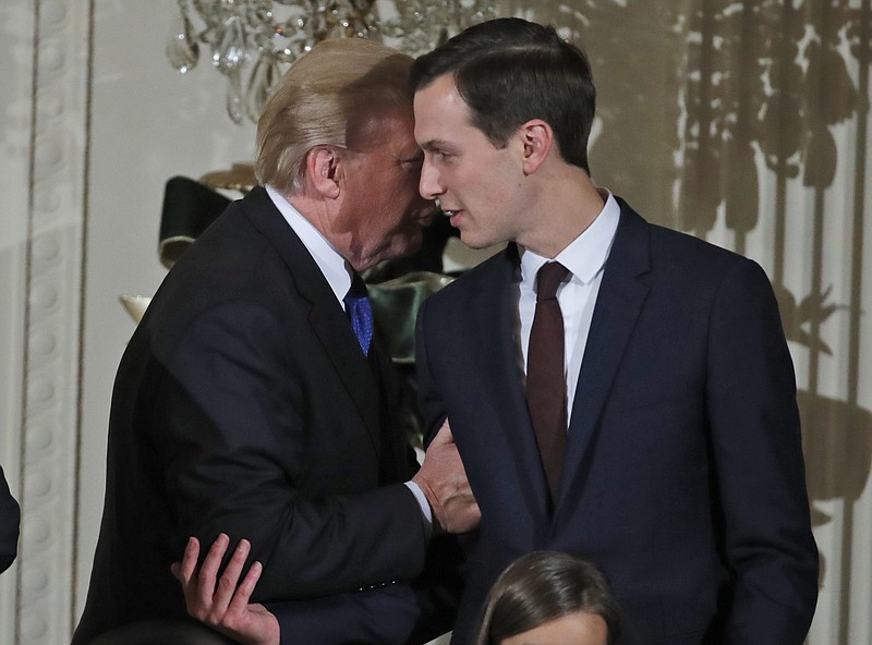 
              FILE - In this Thursday, Dec. 7, 2017, file photo, U.S. President Donald Trump speaks with White House Senior Adviser Jared Kushner as he departs after a reception in the East Room of the White House, in Washington. A collaboration between the Trump Organization and Kushner's family firm on a pair of hotels in New Jersey is over. Ethics watchdogs have said the collaboration could have compromised Kushner's role as an adviser to Trump. (AP Photo/Alex Brandon, File)
            
