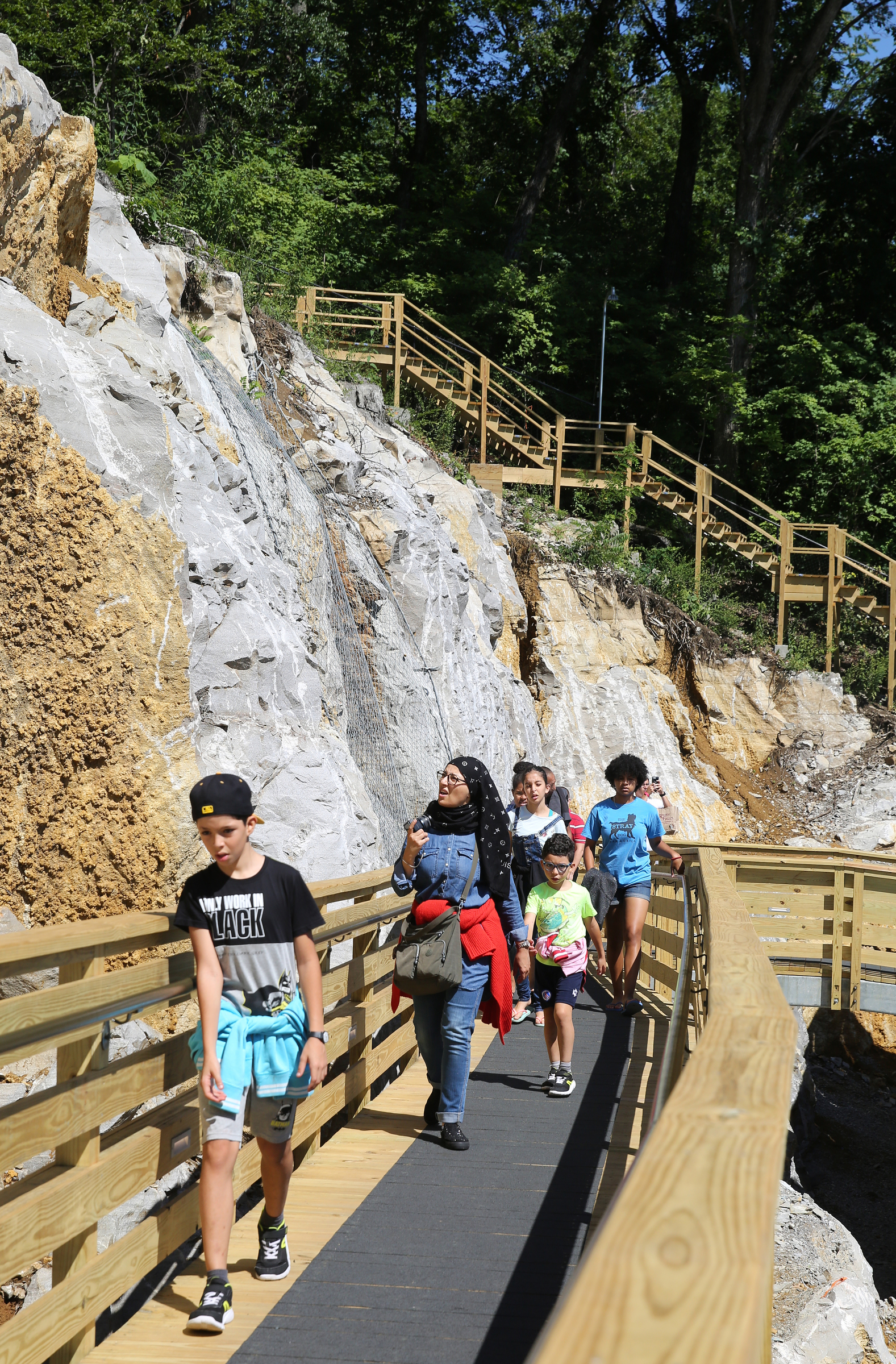 Visitors make their way down a new walkway at Ruby Falls Friday, June 22, 2018 on Lookout Mountain in Tennessee. The attraction, which sees about 500,000 visitors a year according to Ruby Falls officials, has undergone an expansion including the walkway which leads to an overlook area.