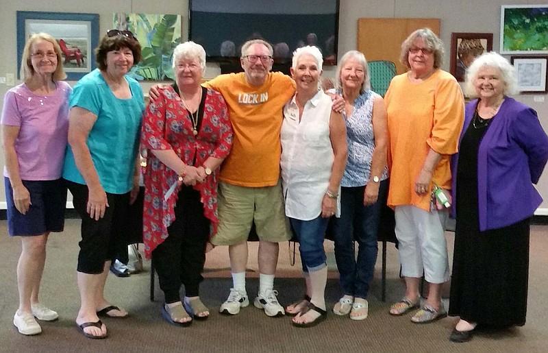 Among the winners in the Community Artists League of Athens' June open show are, from left, Lyda Mannone, Sheila Chesanow, Katie Kenney, Allan Sibley, Sally Fleming, Debbie Kowalczyk, Diana Ferguson and Laura Abbott. Their works will be on view through Saturday, June 30, at the E.G. Fisher Library in Athens, Tenn. (Photo from Sally Fleming)