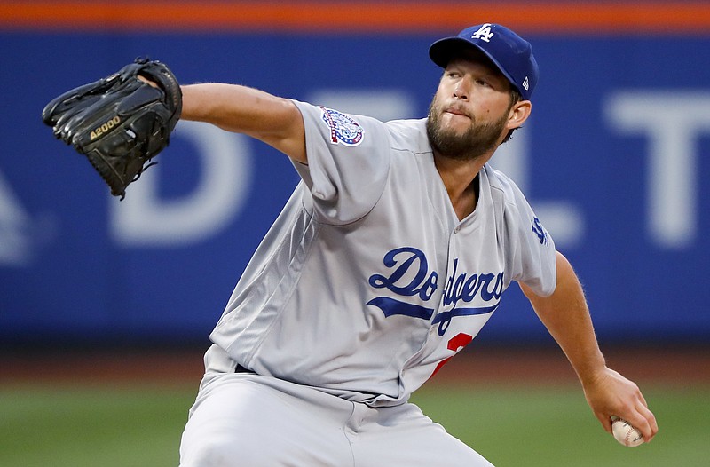 
              Los Angeles Dodgers pitcher Clayton Kershaw throws to a New York Mets batter during the second inning of a baseball game Saturday, June 23, 2018, in New York. (AP Photo/Julie Jacobson)
            