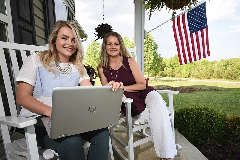 Chloe Smallwood, left, who is a grad student at WGU, and her mother, Kim Slaughter, program mentor for WGU University, work from home in Dunlap.