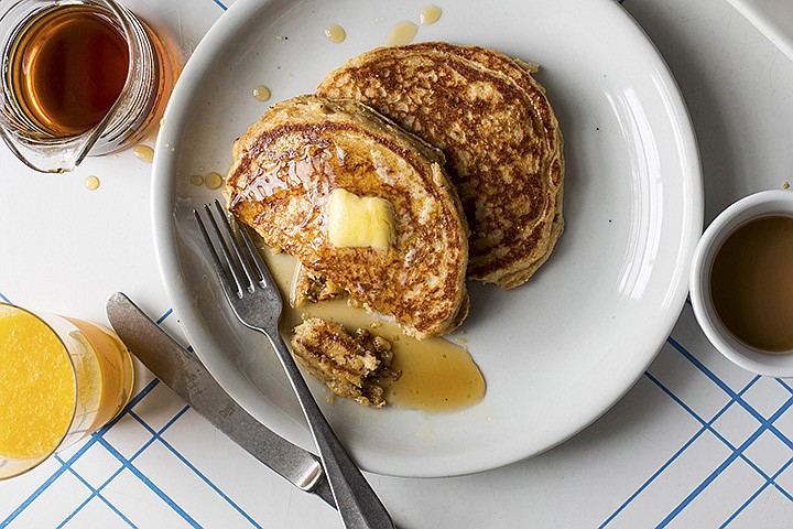 Whole grain pancakes in New York, June 2, 2018. A mix of whole-wheat flour, cornmeal and oats gives these pancakes an appealing earthiness. (Andrew Scrivani/The New York Times)