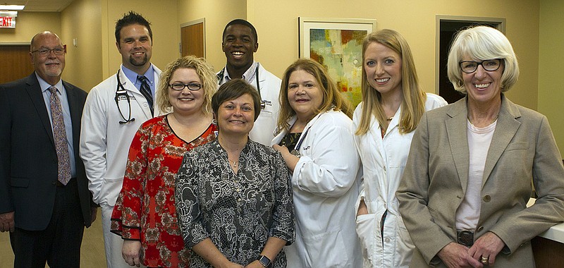 Staff with the Hamilton Physician Group pose during the Catoosa campus' open house. From left are group Director Johnny Edwards, nurse practitioner Kyle Parton, practice manager Stacy Smith, group Executive Director Mary Scalf, physician assistant Ben Oliver (back), nurse practitioner Sherry Scroggins, Megan Brown, MD, and Hamilton Medical Center COO Sandy McKenzie. (Contributed photo)