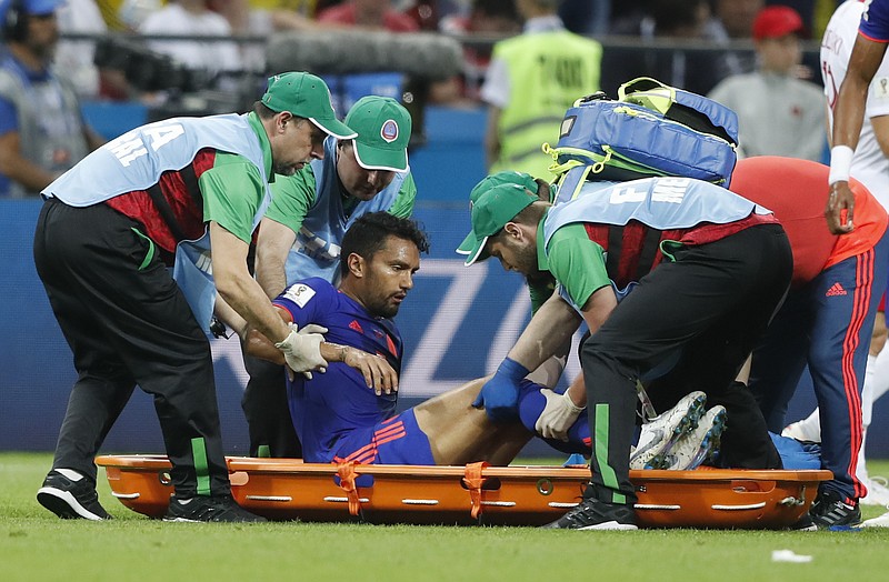 
              Colombia's Abel Aguilar is carried on a stretcher out of the pitch after being injured during the group H match between Poland and Colombia at the 2018 soccer World Cup at the Kazan Arena in Kazan, Russia, Sunday, June 24, 2018. (AP Photo/Frank Augstein)
            