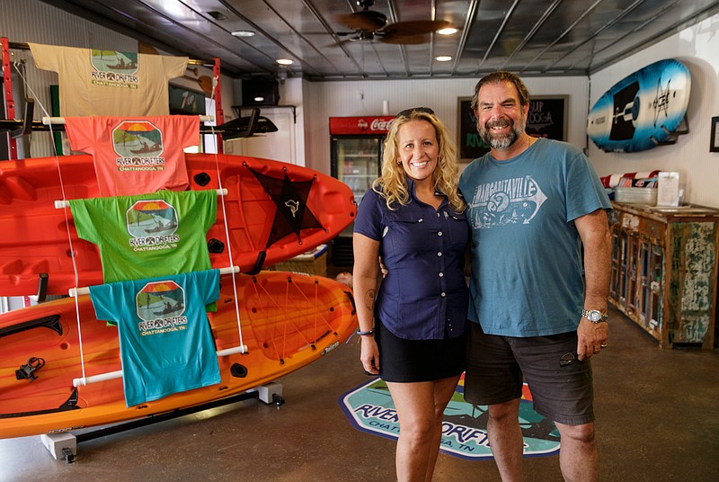 Owners Charlie Eich, right, and Renee Eich pose for a portrait in the River Drifters Bar & Grill on Wednesday, June 27, 2018, in Chattanooga, Tenn. The new restaurant and paddle rental spot on Suck Creek Road opens July 2.