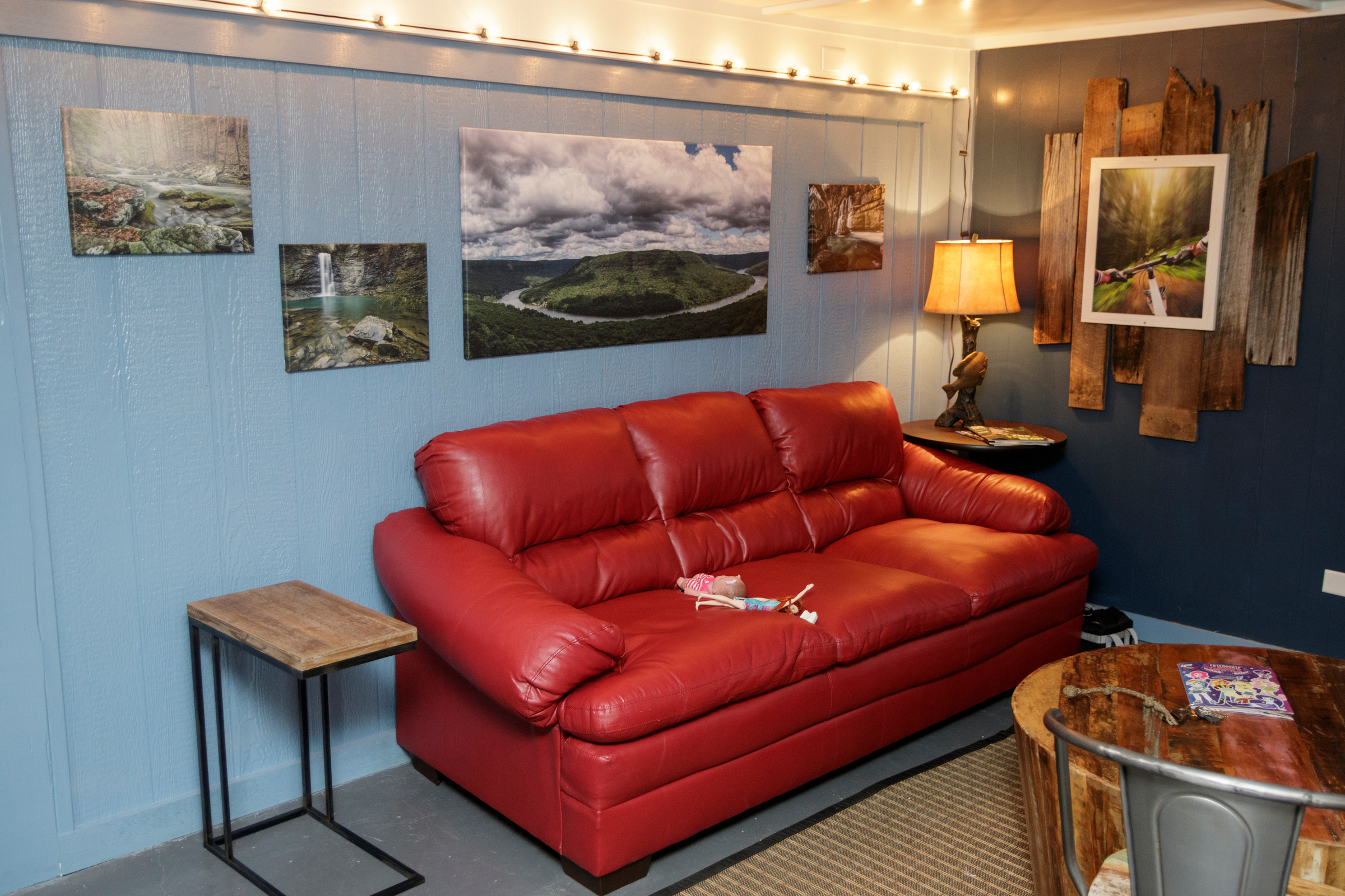 A red leather couch is seen in the River Drifters Bar & Grill on Wednesday, June 27, 2018, in Chattanooga, Tenn. The new restaurant and paddle rental spot on Suck Creek Road opens July 2.