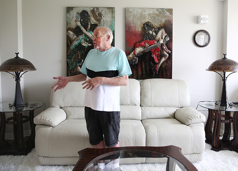 James Breedwell, president of the River View Towers Residents Association, shows off his living room at River View Towers Friday, June 8, 2018 in Chattanooga, Tennessee. The apartments are being renovated for low-income, elderly individuals.