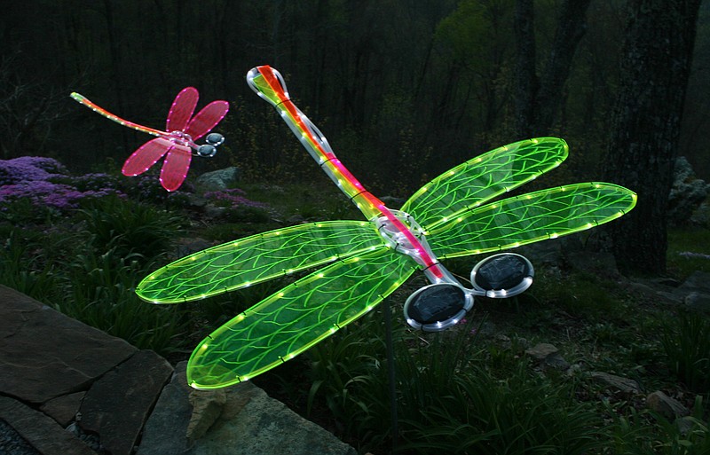 Dragonflies fashioned from acrylic and solar lights by Charlie Yowell.