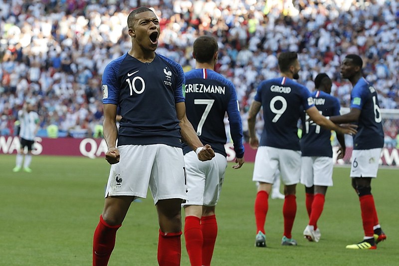 France's Kylian Mbappe celebrates after scoring against Argentina for the second time during an elimination match Saturday at the World Cup in Kazan, Russia. France won 4-3 and will face Uruguay in the quarterfinals.