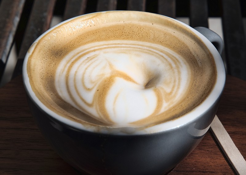 This Thursday, March 29, 2018 photo shows a cup of coffee at a cafe in Los Angeles. 