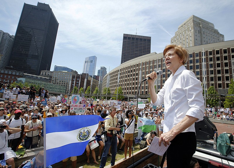 FILe - In this June 30, 2018, file photo, Sen. Elizabeth Warren, D-Mass., speaks during a Rally Against Separation in Boston. 