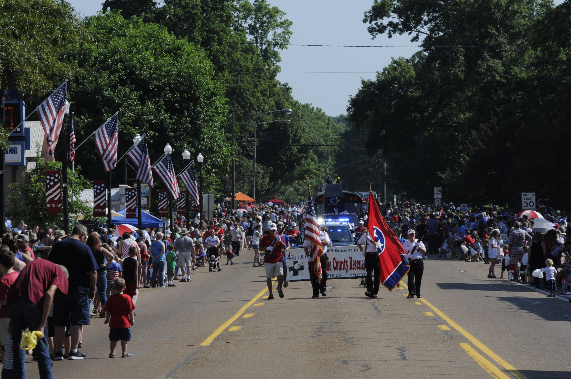 Hundreds line the street as the annual Fourth of July parade begins Wednesday morning in downtown Dunlap.