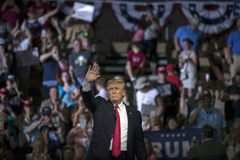 President Donald Trump is cheered by supporters at a rally in Great Falls, Mont., on Thursday.