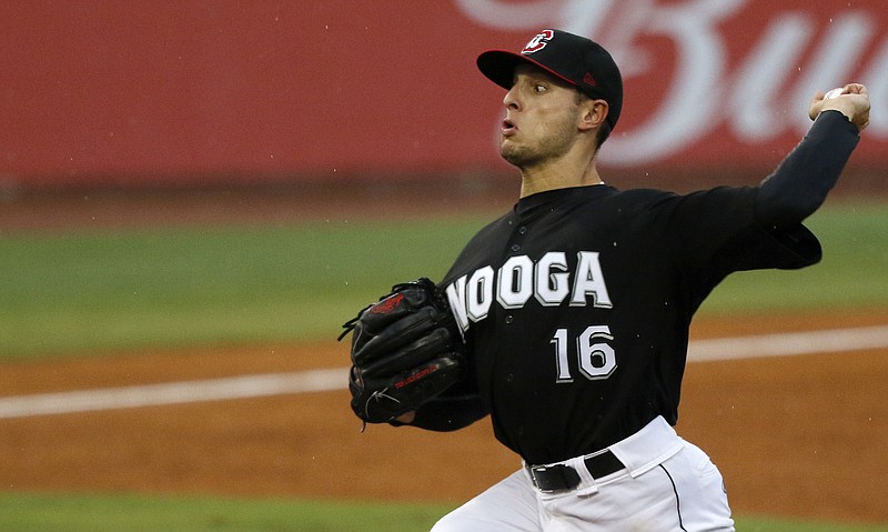 Chattanooga Lookouts pitcher Anthony Marzi delivers to a Birmingham Barons batter in the top of the second inning during Friday night's game at AT&T Field. The Barons won 3-1.