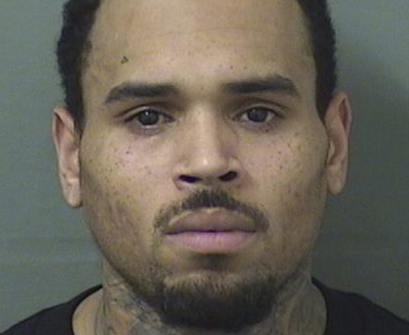 This booking photo provided by Palm Beach County Sheriff's Office shows Chris Brown. The singer walked off stage after his concert in Florida and into the hands of waiting sheriff's deputies, who arrested him on a felony battery charge and booked him into the Palm Beach County Jail. A sheriff's spokeswoman said the entertainer was released after posting $2,000 bond on the battery charge issued by the sheriff's office in Hillsborough County. No details about the allegations in the arrest warrant were immediately available. (Palm Beach County Sheriff's Office via AP)