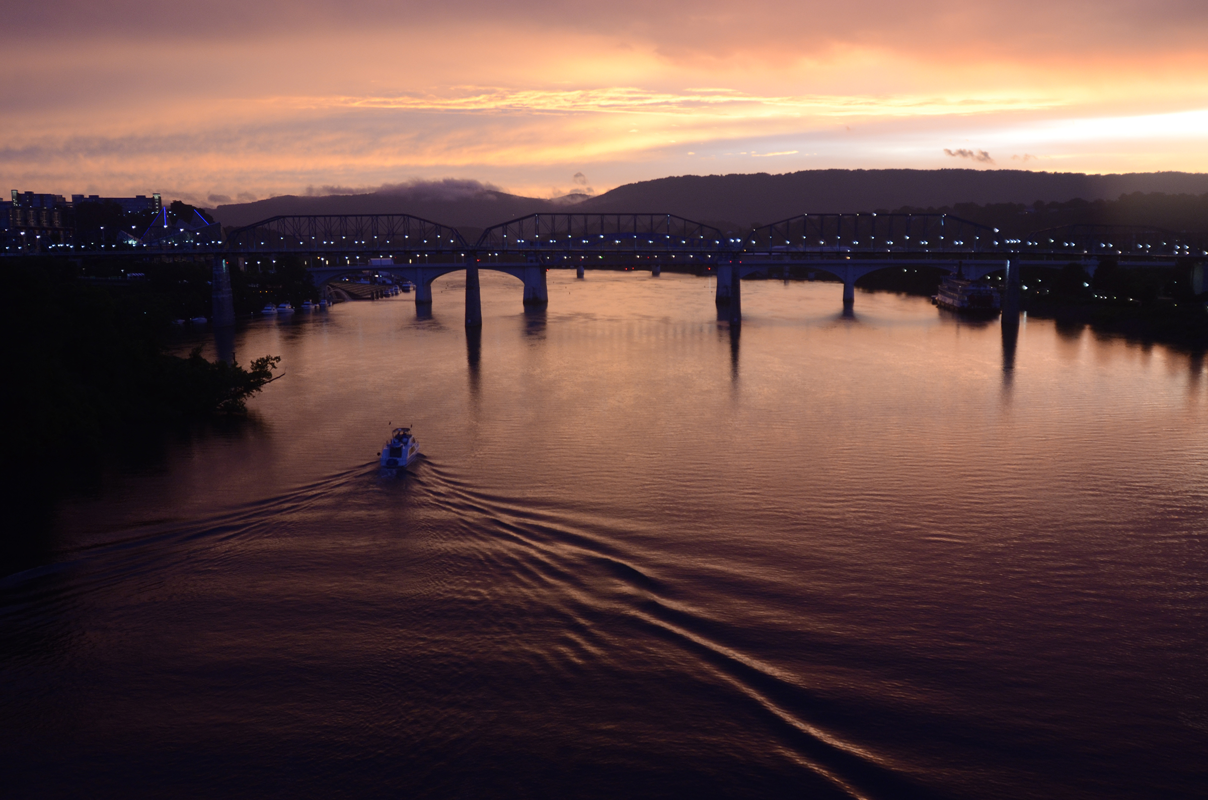 The sun sets over the Tennessee River.