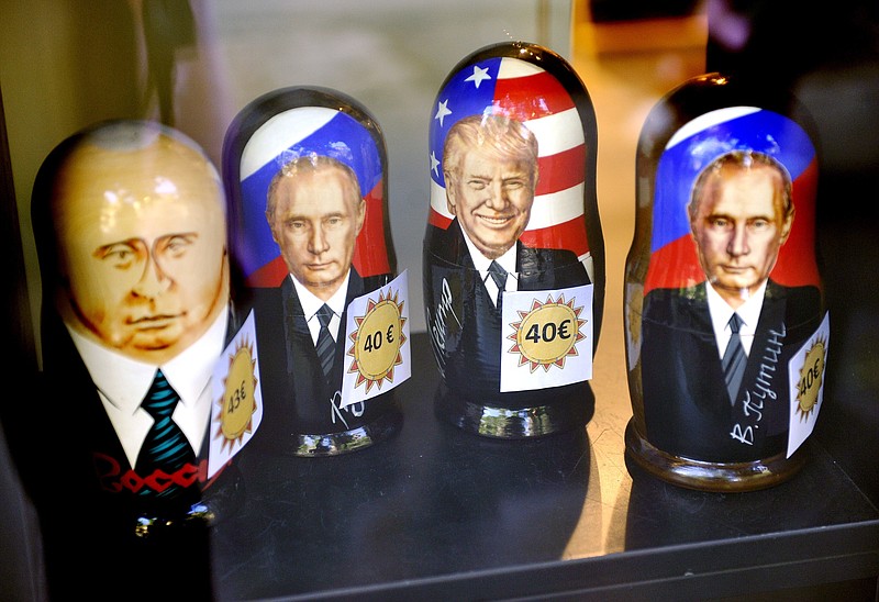 
              Russian Matryoshka dolls depicting Russian President Vladimir Putin and U.S. President Donald Trump are on sale in the Ruslania book store in Central Helsinki, Monday, July 9, 2018. Putin and Trump are scheduled to meet in Helsinki on Monday, July 16. (Timo Jaakonaho/Lehtikuva via AP)
            