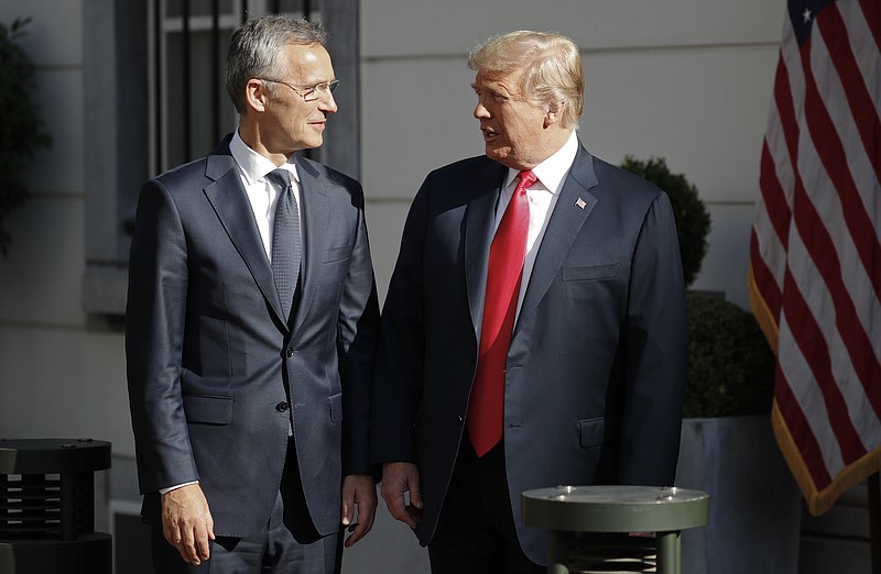 U.S. President Donald Trump, right, talks with NATO Secretary General Jens Stoltenberg, left, prior to their bilateral breakfast, Wednesday, July 11, 2018 in Brussels, Belgium. (AP Photo/Pablo Martinez Monsivais)

