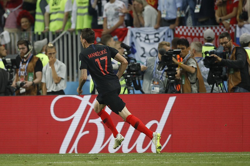 Croatia's Mario Mandzukic celebrates after scoring his team's second goal during Wednesday's World Cup semifinal in Moscow. Croatia won 2-1 and will take on France in Sunday's title match in Moscow.