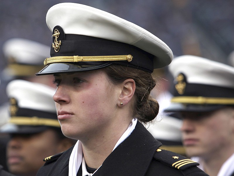FILE - In this Dec. 14, 2013 file photo, Navy women's soccer goalkeeper Elizabeth Hoerner stands in formation before the start of the Army Navy NCAA college football game at Lincoln Financial Field in Philadelphia.