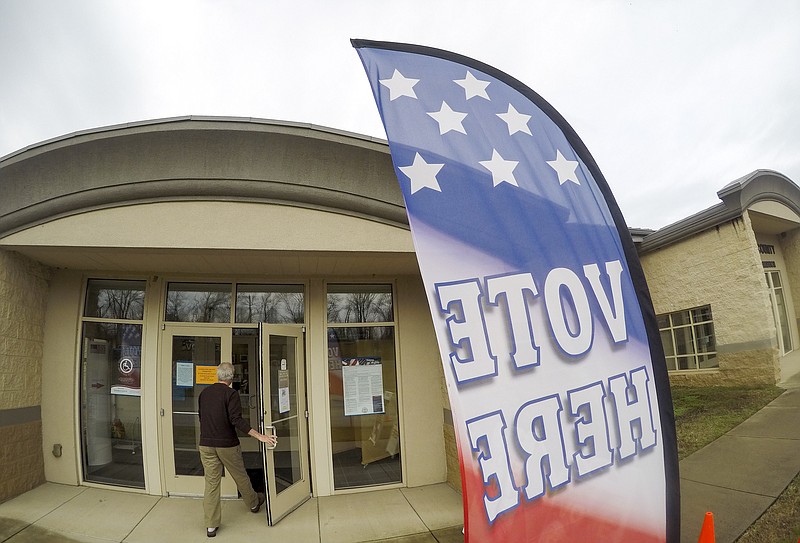A voter enters the Hamilton County Election Commission for early voting in 2017.