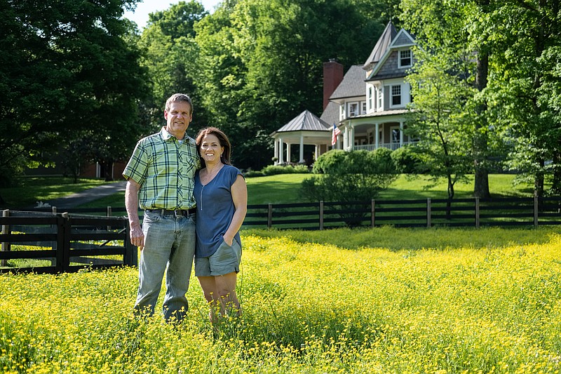 Republican gubernatorial candidate Bill Lee stands with his wife, Maria, at his family farm in Franklin, Tenn.