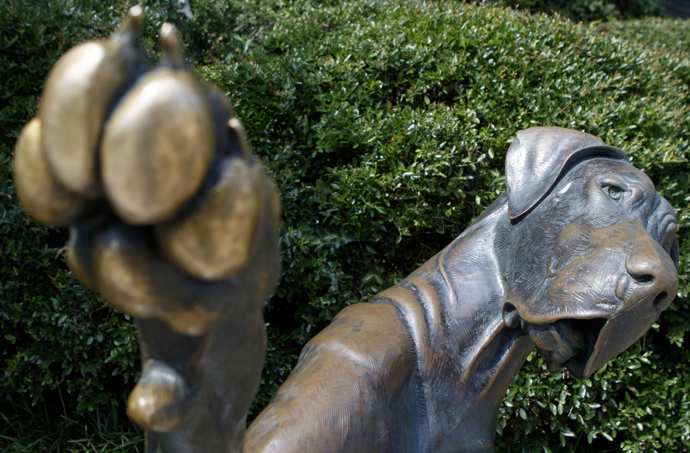 "High Four" by Louise Peterson stands in the First Street Sculpture Garden, near the downtown entrance to the Walnut Street Bridge, on Wednesday, July 11, 2018 in Chattanooga, Tenn.