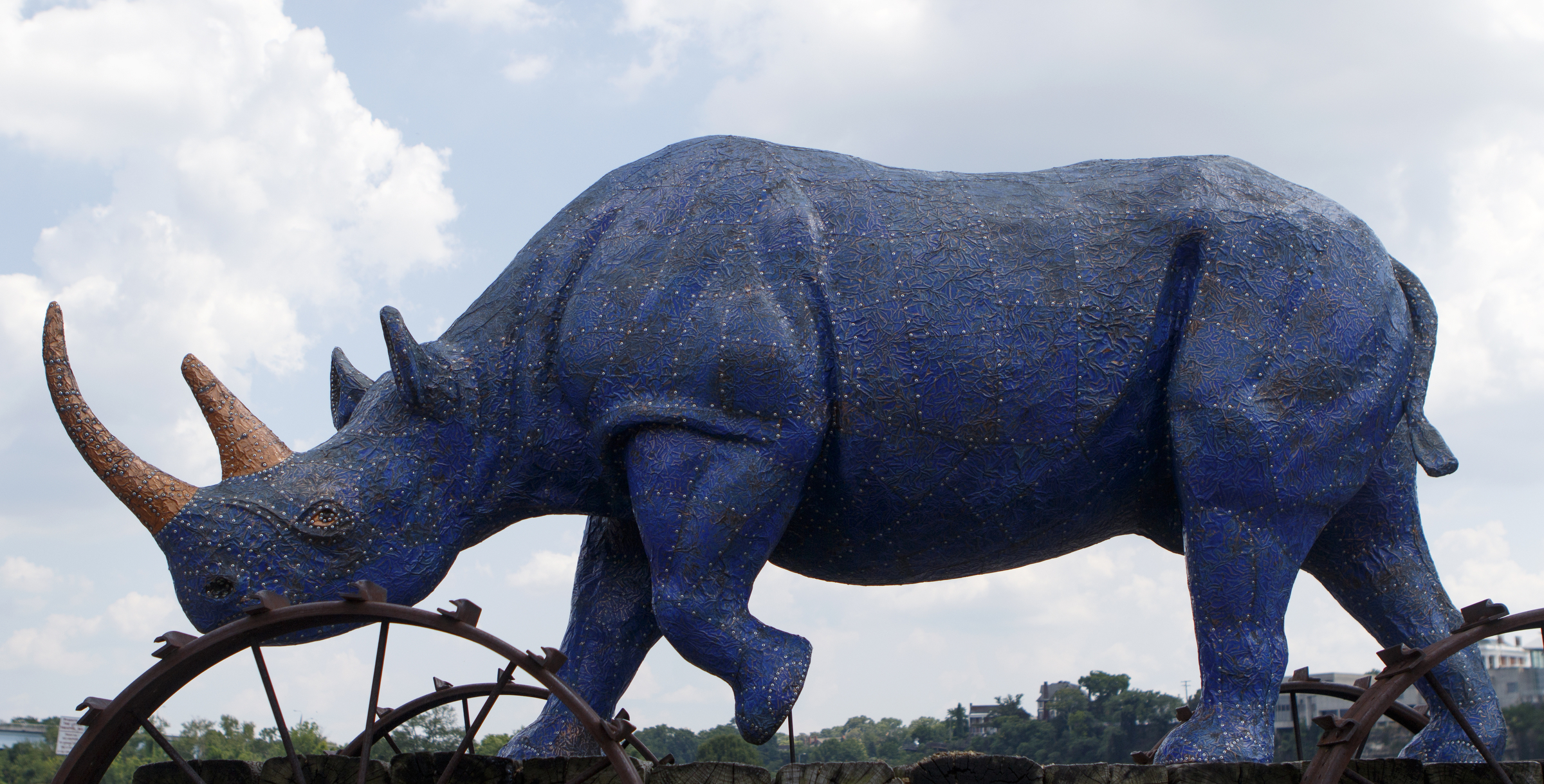 "Blue Boy Pull Toy #1" by John Petrey sits on the Northshore, outside the Chattanooga Theatre Centre, on Wednesday, July 11, 2018 in Chattanooga, Tenn.