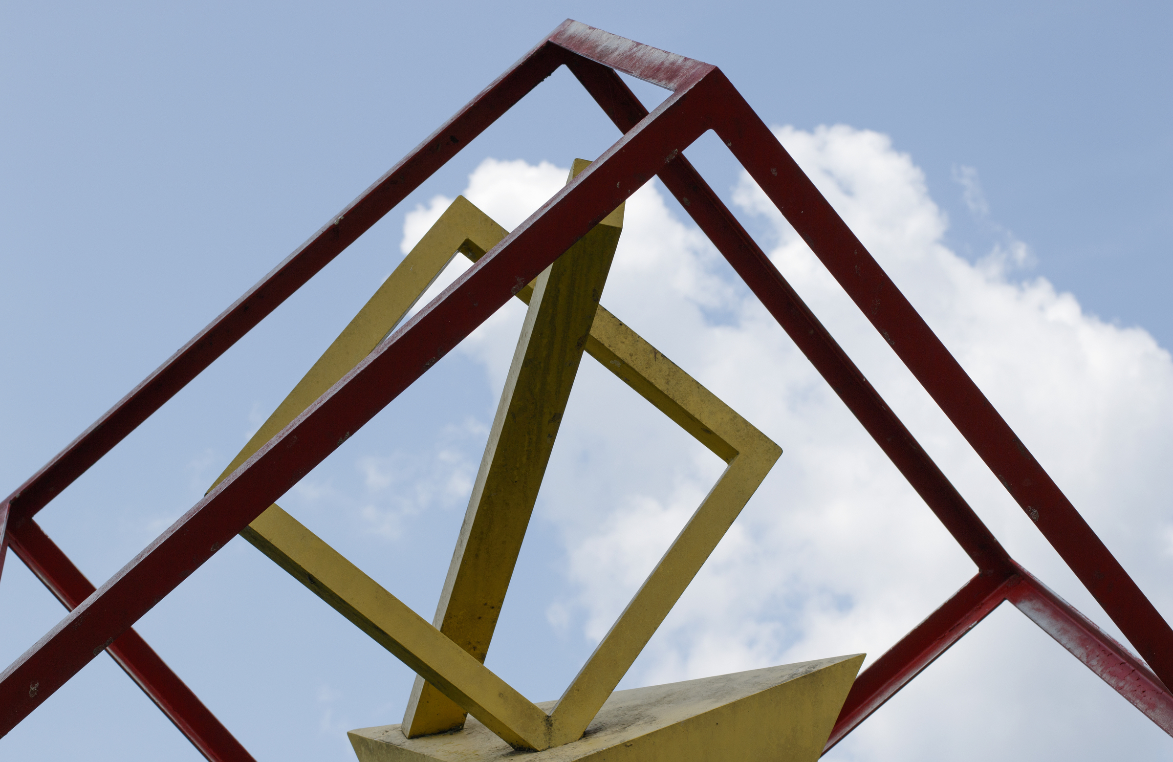 "Geometry in a Box" by Samuel Burns stands in the Jefferson Heights Park on Wednesday, July 11, 2018 in Chattanooga, Tenn.