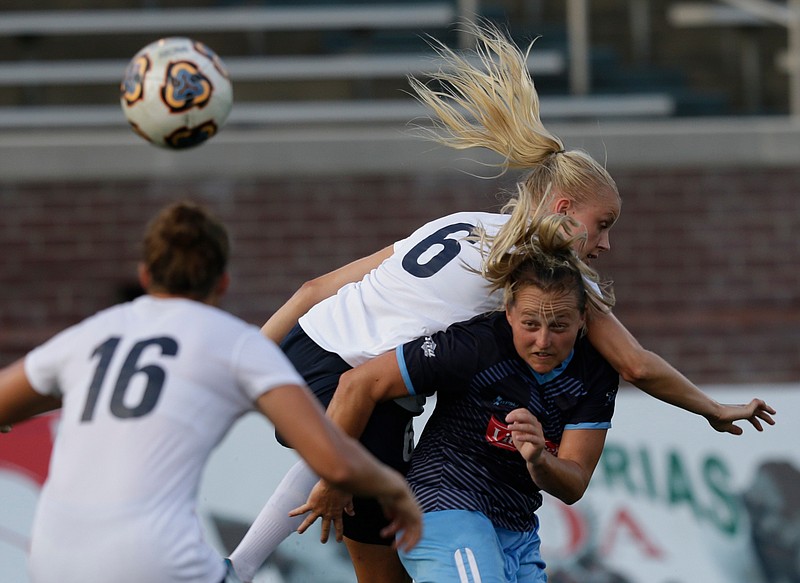 Pensacola FC's Emelie Liljered lands atop Chattanooga FC's Carlie Banks during their WPSL South Region semifinal Friday night at Finley Stadium.