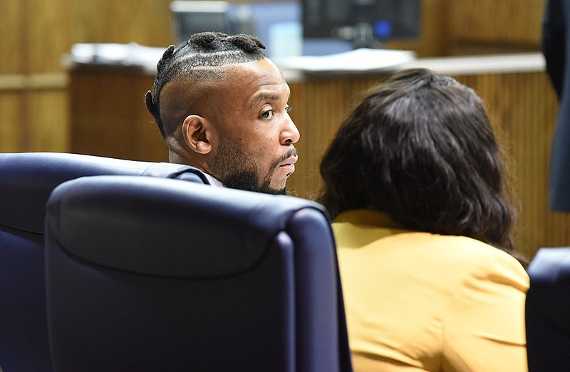 Stephen Mobley, 34, sits left of defense attorney Eliza Williams on Tuesday, July 10, in Judge Barry Steelman's courtroom during jury selection.