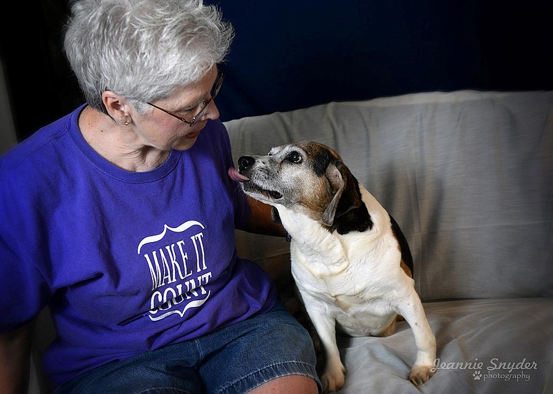 Pam Vandergriff shares her couch with Merle, who is about 12 years old and who ended up in high-kill shelter when his owner passed away. Merle is very sweet and vocal, and he loves treats, Vandergriff said.