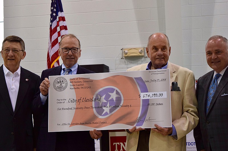 From left, State Representative Dan Howell, Commissioner John Schroer, Mayor Tom Rowland and state Representative Kevin Brooks announced a transportation grant for Cleveland, Tenn.