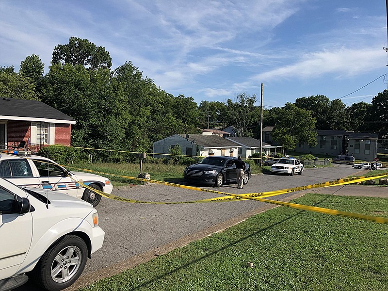 Chattanooga police officers investigate the scene of a shooting on Arlington Avenue where one person was killed on Wednesday, July 18, 2018.