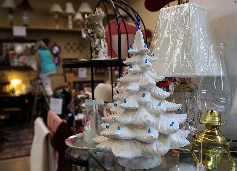 Staff photo by Erin O. Smith / 
An antique ceramic tree during the annual Christmas in July promotion at Yesteryear Antiques and Memories Wednesday, July 18, 2018 in East Ridge, Tennessee. Yesteryear's Christmas in July sale will go through July 31. 