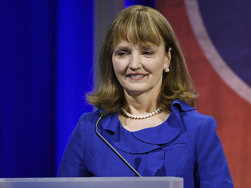 In this Jan. 23, 2018, file photo, Tennessee House Speaker Beth Harwell addresses the audience during the Gubernatorial Forum on Education at Belmont University in Nashville, Tenn. A U.S. Supreme Court ruling making it easier to collect online sales taxes could yield billions of dollars for state and local governments, if they decide to keep it. Rather than spend the windfall on schools, prisons or other government services, some Republican governors and lawmakers are proposing to give it away in the form of additional tax cuts to residents. Harwell, a republican candidate for governor, wants to lower the state's 7 percent sales tax rate. (George Walker IV/The Tennessean via AP, Pool, File)