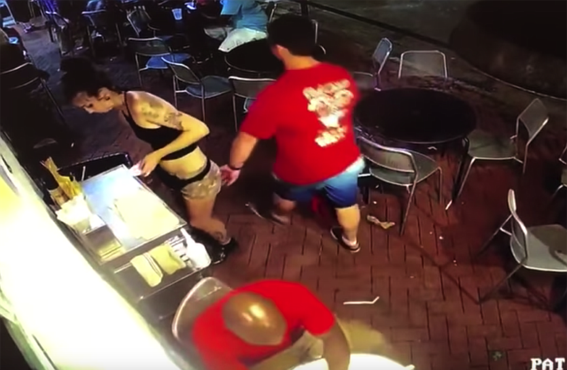 Video from a Georgia restaurant shows a man reach out and touch the backside of a female server, who quickly grabs him by the collar and slams him into a wall.