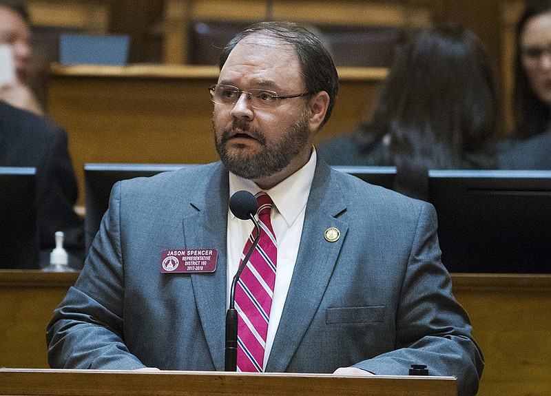 In this Feb. 28, 2018 photo, Rep. Jason Spencer, of Woodbine, speaks at the Georgia State Capitol in Atlanta. Spencer is seen using racial slurs and dropping his pants in an episode of Sacha Baron Cohen's Showtime series "Who Is America?". In the Sunday, July 22, broadcast, Spencer repeatedly uses a racial slur for African Americans and later exposes his bottom after being told it helps scare away Muslim terrorists. (Alyssa Pointer/Atlanta Journal-Constitution via AP)

