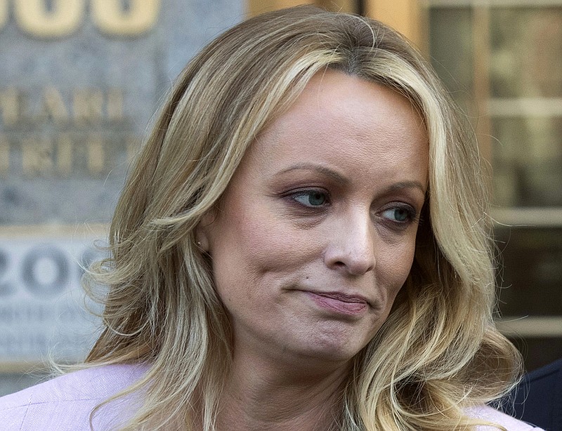FILE - In this April 16, 2018, file photo, adult film actress Stormy Daniels speaks outside federal court, in New York. 
