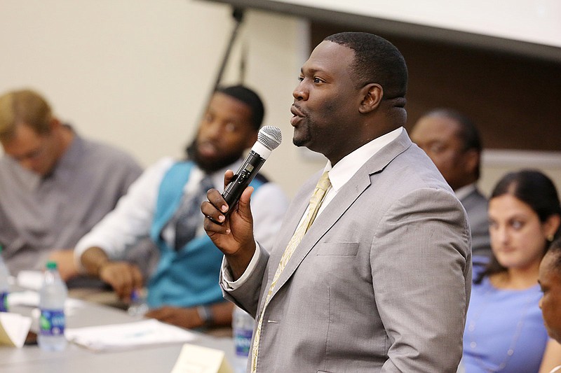 Dennis Clark, a candidate for the Tennessee House of Representatives District 28, introduces himself during a debate with Tennessee House of Representatives District 28 candidates and Hamilton County Commission District 4 candidates hosted by the NAACP Monday, July 23, 2018 at the University of Tennessee at Chattanooga Student Center in Chattanooga, Tennessee. 