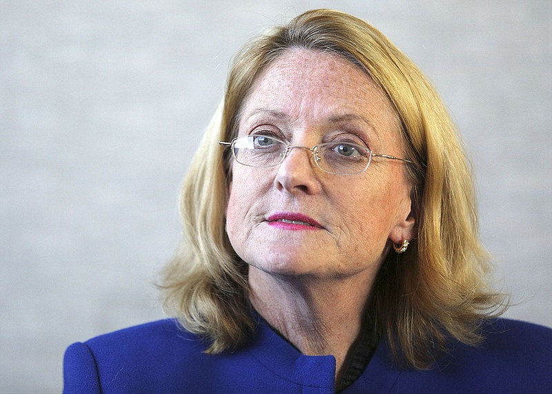 Catherine Cate White, a candidate for Division One Circuit Court judge, speaks to reporters during an editorial board meeting at the Chattanooga Times Free Press on Wednesday, April 9, 2014.