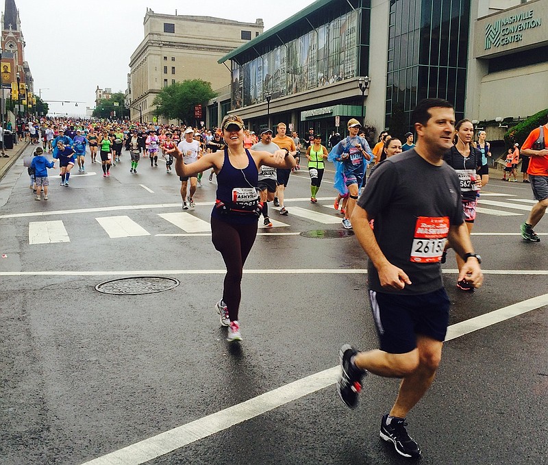 Amy Donahue finishes a half-marathon, one of the goals on her "30 before 30" list. 

