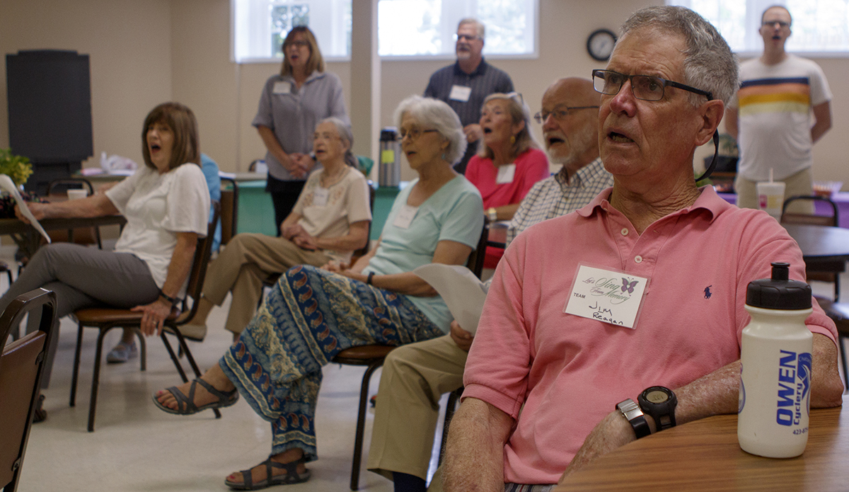 Jim Reagan sings during the Let's Sing From Memory event.