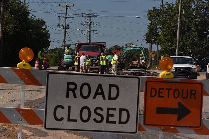 Tennessee American crews prepare to cut pavement as another water main break closes a portion of Hixson Pike near Lupton Drive on Thursday morning, July 26, 2018.